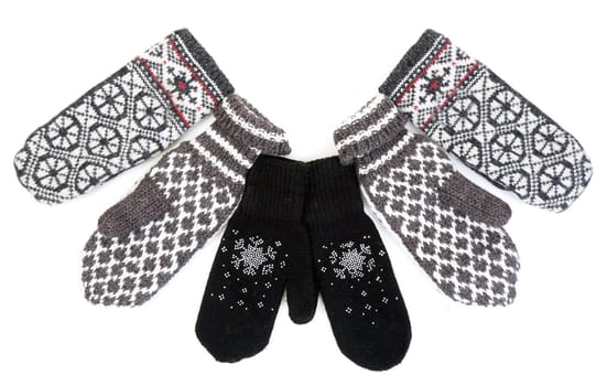 Winter knitted gloves isolated on white background