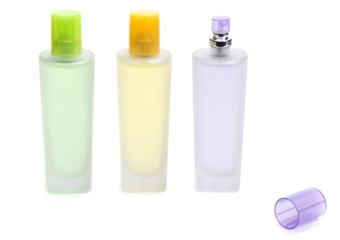 Three perfume bottle isolated on white background