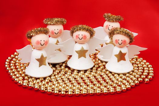 Decorative angel from a set scrapbooking on a red background