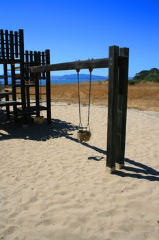 New playground in a schoolyard in summer.
