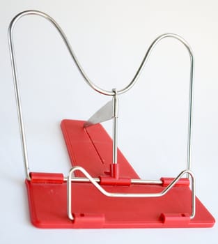 empty red bookholder on a white background