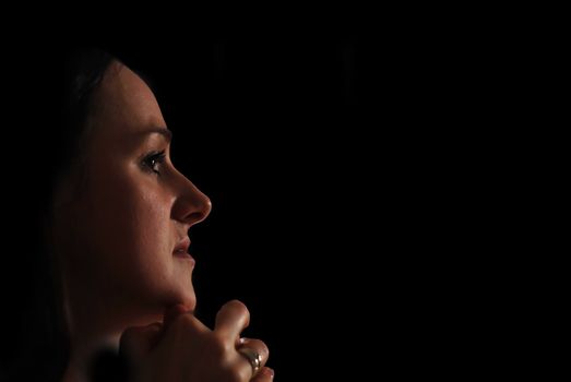 Low key young woman portrait