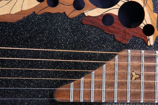 strings of black classic electrical guitar music equipment