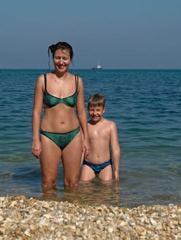 Mum and the son on the beach