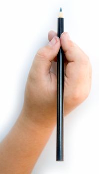 Children's hand with a pencil on a white background