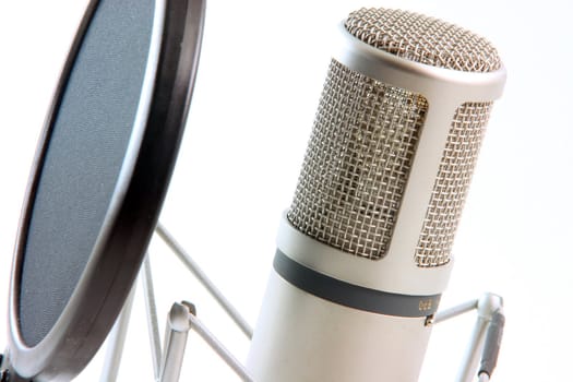 detail from microphone and filter isolated on white music concepts horizontal