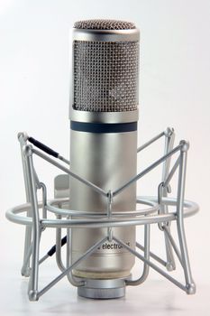 music recording microphone on white studio tools