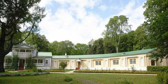 Rural landscape. The beautiful house on a green meadow.