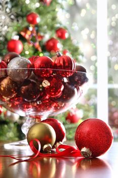 Red Christmas balls on table for the holidays