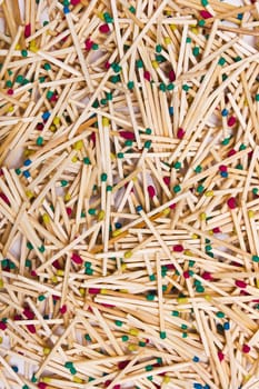 background of wooden matches with red and green heads