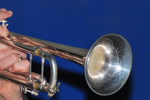 trumpet being held