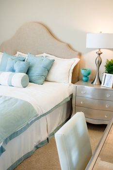 Pretty blue and white bedroom with a twin bed
