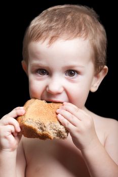 Poverty people little child boy eating bread food