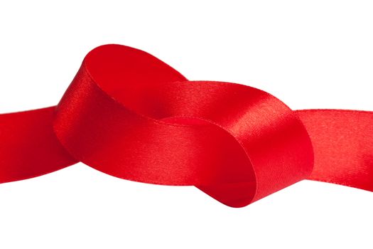 Red silk ribbon over white background