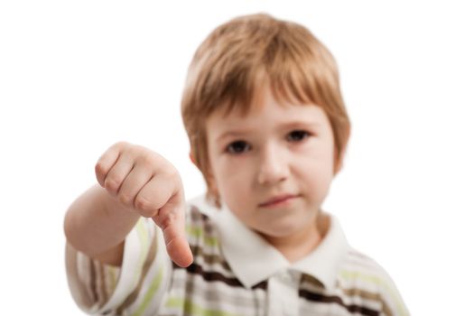 Human child hand gesturing thumb down failure sign
