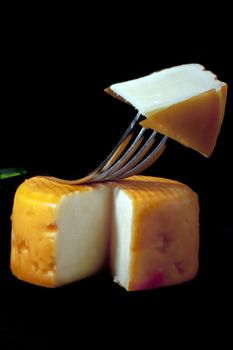 Type of Ecuador cheese on a black background