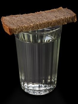 Bread food portion on vodka alcohol drinking glass