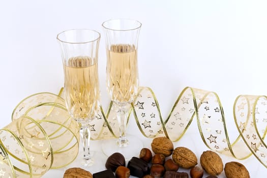 Glass of champagne against white background.