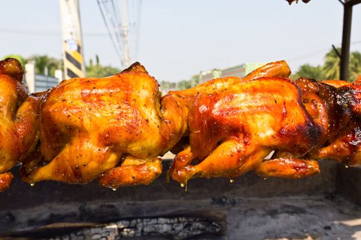 Image of delicious roasted chicken on the spit