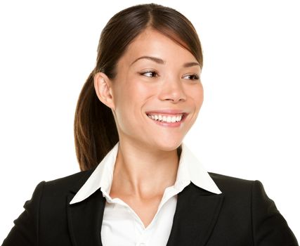 Asian businesswoman looking to the side smiling in black suit. Young female professional in her twenties isolated on white background. Multicultural mixed Caucasian and Chinese Asian.