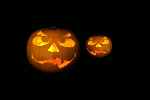 ghastly halloween pumpkin on black background