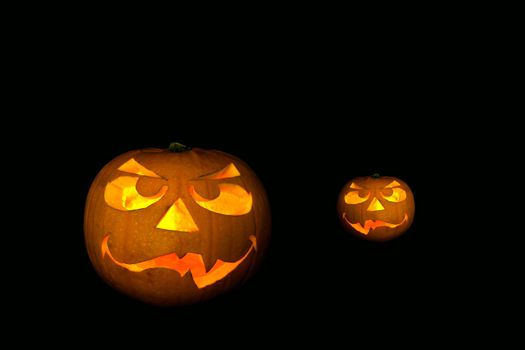 ghastly halloween pumpkin on black background