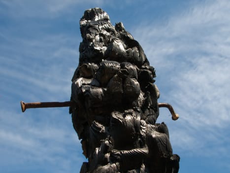 Ruined wood log house burnt by fire to black coal