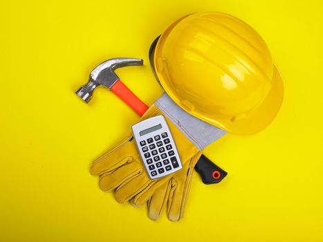 Ready fgor building site - HardHat Hammer Gloves Calculator on white
