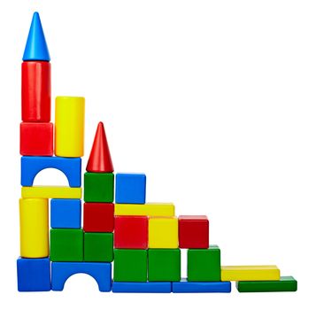 The tower of colored toy blocks isolated on white background