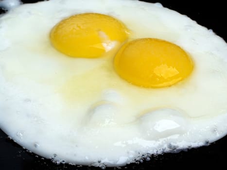 Cooked fried egg food for eating at breakfast meal