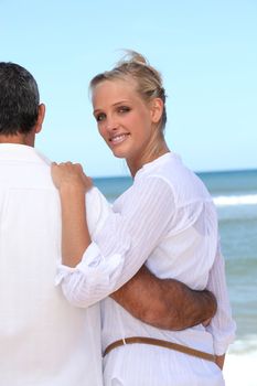 Couple walking on the beach