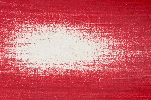Close-up of part of  woodboard texture painted on red.