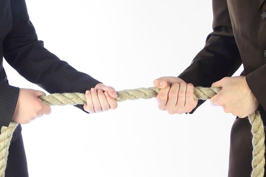 The man and the woman in business suits draw a rope