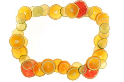 citrus fruits in slices forming a frame