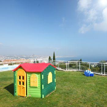 toy  plastic house in mountains