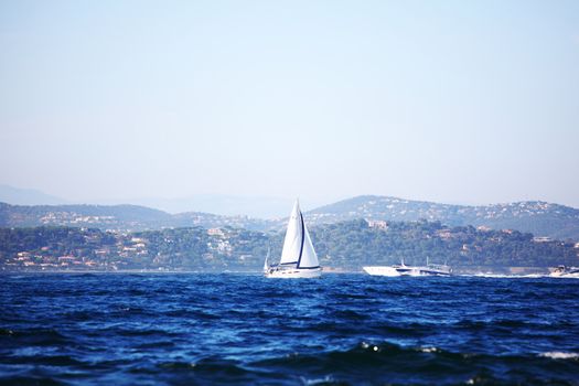sea and sailing boats on it