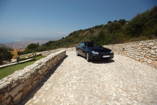 car on road mountain on background