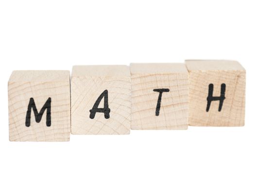 Math written with wooden blocks. White background.