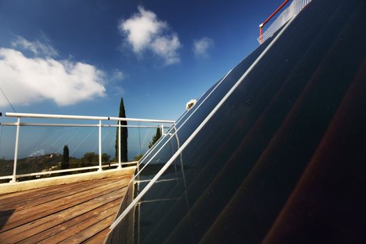 sun battery on blue sky background