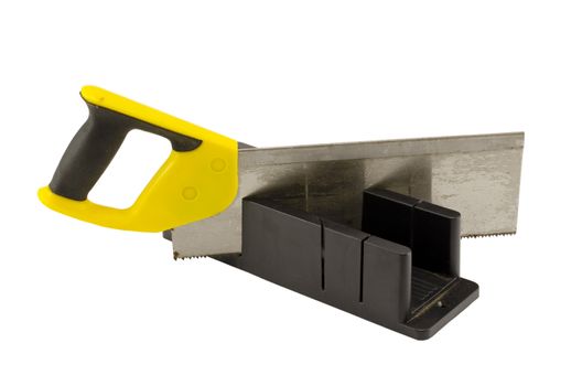 plastic hand saw and angle cut miter box tool isolated on white background
