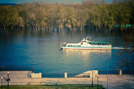 passenger cruise ship on River