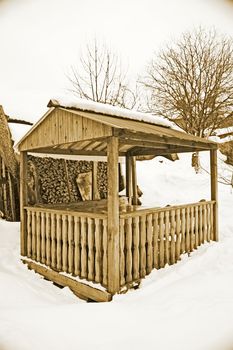 Rural outdoor arbor in winter, vintage photo