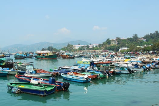 Fishing boats along the coast in Cheung Chau, Hong Kong.