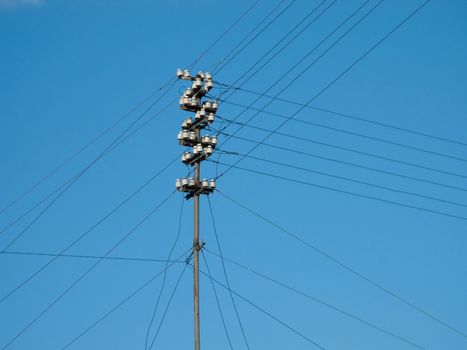 Electricity tower with power line cable and blue sky