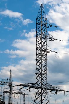 Electricity tower with power line cable and blue sky