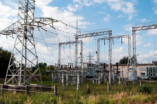 Electricity tower with power line cable and blue sky