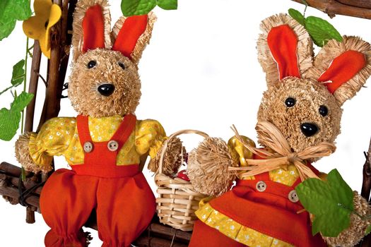 two easter bunnies with basket of eggs