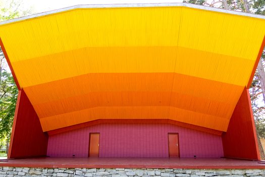 colorful wooden stage in the city park