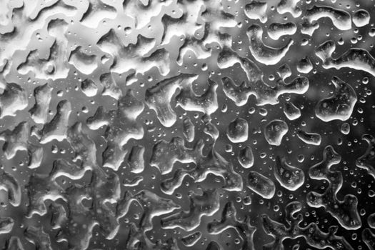 Cold frost ice crystal pattern on frozen window