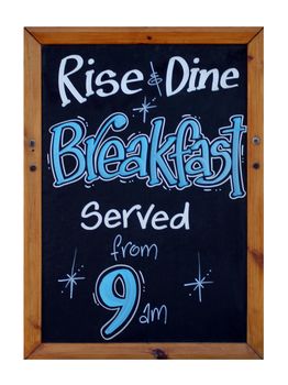 Advert on blackboard for rise and dine breakfast served from 9am.
